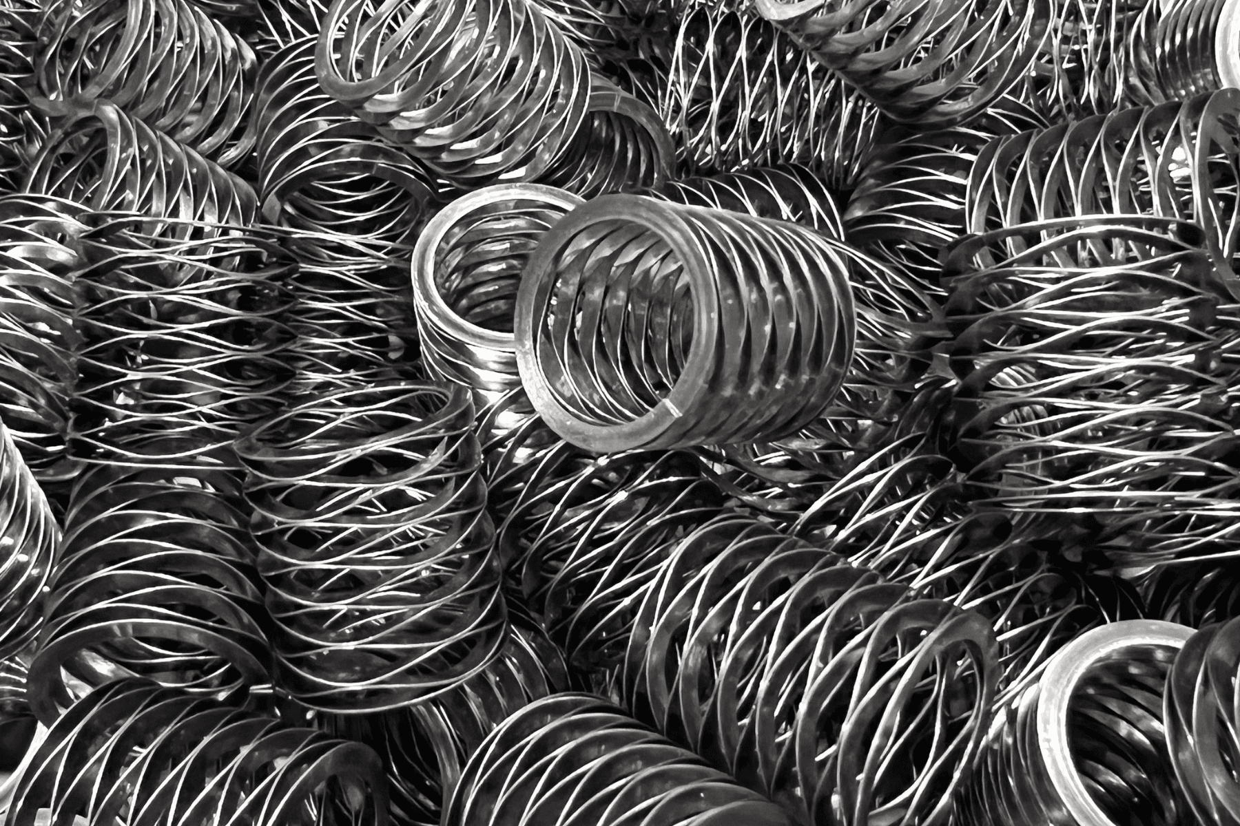 Image of a bulk collection of multi-turn wave springs by Rotor Clip